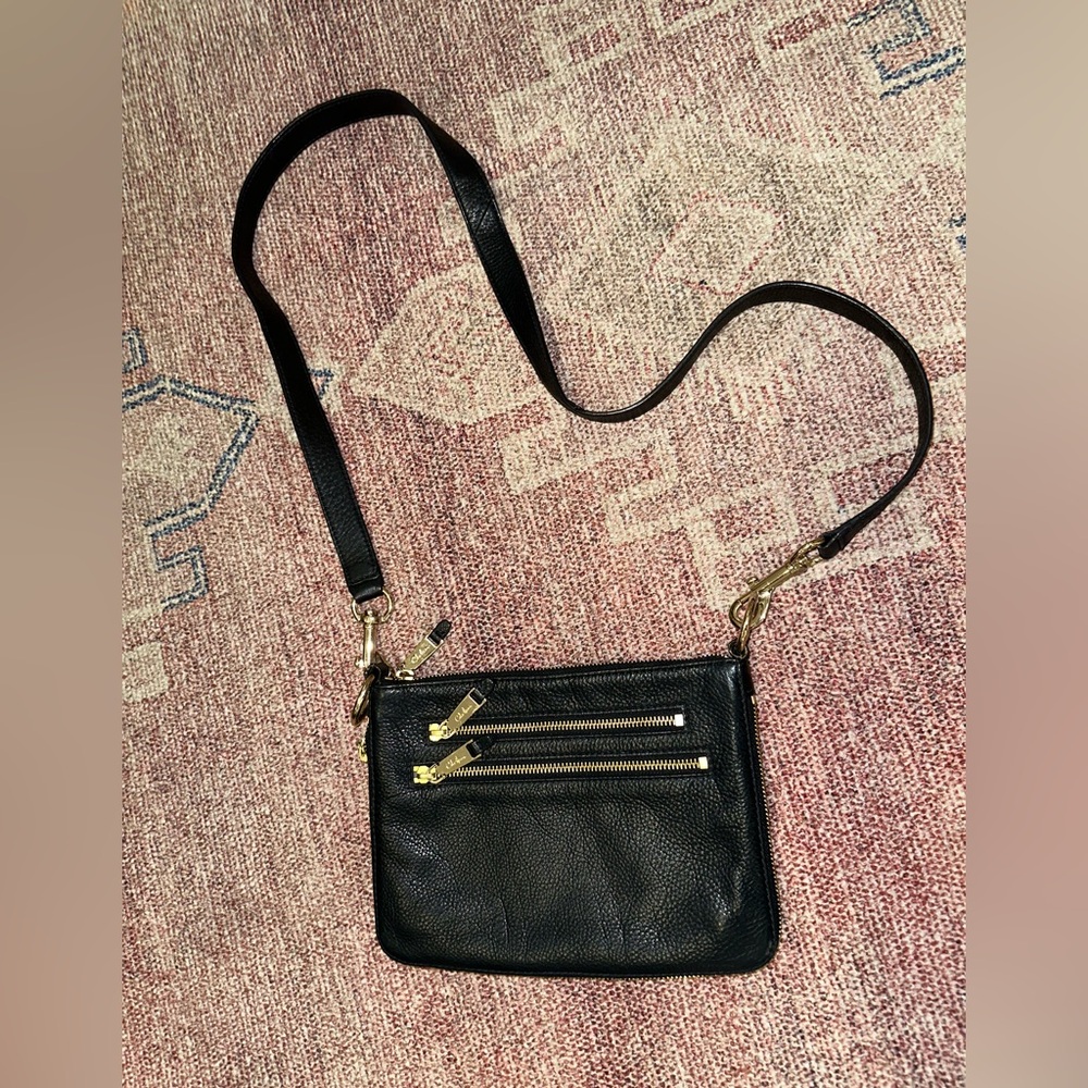 Cole Haan black pebbled leather expandable crossbody bag purse gold hardware